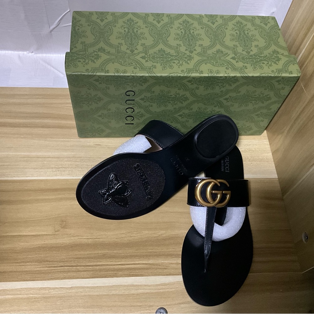 Gucci Black Sandals with Gold Accents - Picture 2 of 3